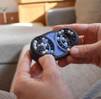 Blue and black butterfly-shaped mechanical puzzle brainteaser fidget with rotating beads held in hands. - andEleven - The Butterfly