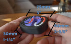 Compact black mechanical puzzle with colorful interconnected pieces, designed as a brainteaser and fidget toy. - andEleven - The Infinity (3-Color)